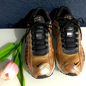 Gorgeous and comfortable athletic shoes. Rose gold with sparkling dark details.